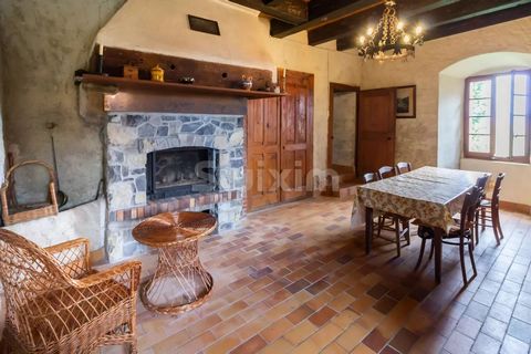 Ref 67896GBL: In the town of Fessy, here is an atypical property with character. This former priory from 1624, home of Carthusian monks, requires work to be able to benefit from its very beautiful volumes and its charm. It has the possibility of crea...