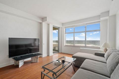 Wake up to the sound of the waves! This light-filled, pet friendly two bedroom, two bath condo offers your own private large balcony with amazing views of the Atlantic Ocean and Rockaway Beach. Features include hardwood floors, an open chef`s kitchen...