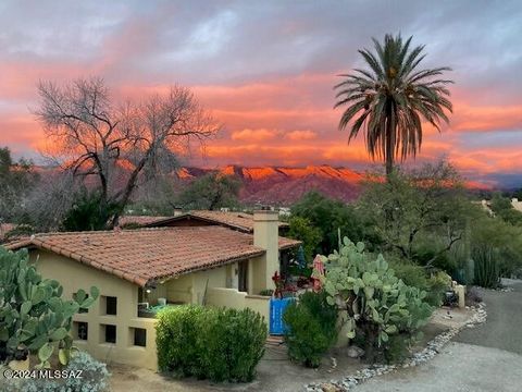 QUINTESSENTIAL JOESLER ON 7+ ACRES IN THE ''OLD '' CATALINA FOOTHILLS. THIS ONE HAS IT ALL! CHARM AND CHARACTER OOZING FROM EVERY ROOM. THE GORGEOUS BEAMED CEILINGS TO THE FABULOUS COLORED TILE FLOORS AND MULTIPLE FIREPLACES.A BEAUTIFUL SUN ROOM OVER...