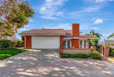 Nestled in the heart of Brea, this exceptional residence is located in the most coveted and desirable area, perched atop the rolling hills that grace this charming city. This home offers a breathtaking city lights view , allows you to enjoy a spectac...