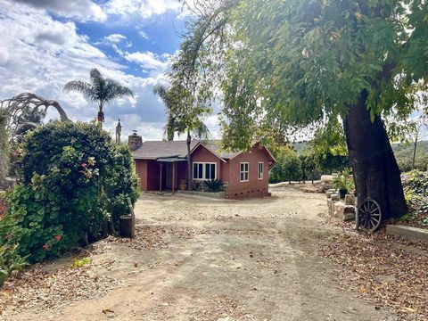 Nestled at the base of Palomar Mountain, this picturesque 8.34-acre agricultural property offers an idyllic retreat for those seeking tranquility amidst the serene countryside. Encompassing lush citrus orchards and breathtaking views, this parcel pre...