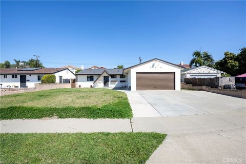 Three bedroom home in Buena Park! Features new carpet and freshly painted exterior and interior, new dishwasher, smooth ceilings, mirrored closets, ceiling fans, covered patio, block wall fence all within walking distance of schools, and near major f...