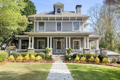 Welcome to 205 Peachtree Circle - this classic home, built in 1900, is one of Ansley Park's oldest and sits on one of the neighborhood's largest lots - well over an acre in the heart of Midtown Atlanta! The expansive wraparound front porch sets a sop...