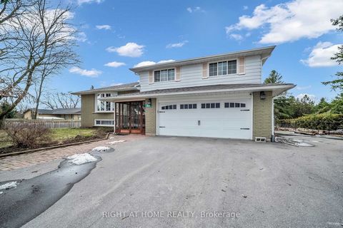 Huge piece of land with a very beautiful and roomy Side split house. Very bright and sunny on the West side of 2nd Concession. Conveniently close to all shopping and amazing schools. Close to new developments with lots of future potentials. Minutes f...