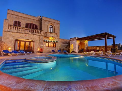 This exquisite detached villa oozes Gozitan charm and character with many traditional features such as limestone vaulted arches wooden beams and solid wood furniture. The large living room has a beautiful fireplace and stunning stairway leading to th...
