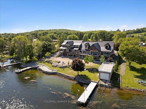 A Precedence Has Been Set! This NEW WATERFRONT RESIDENCE Is Striking & Unmatched In The Caliber Of Construction & Finishes. Sited On A Double Lot, Boasting Over 200 Feet Of Armour Stone Shoreline. An Ideal Multi-Generational Family Waterfront Home. T...