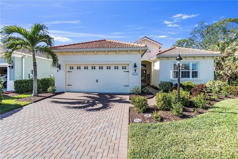 Nestled in the highly sought-after enclave of The Cove within Grand Palm, this meticulously maintained 3-bedroom, 2.5-bathroom home offers an inviting retreat with exceptional privacy and serene pond views. The Cove is a maintenance-free community fe...