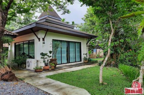 This is a large 332 sqm house for sale in a tropical green zone. The home is comes with six bedrooms, all with ensuite bathrooms and a living space that includes a Thai kitchen. There is also a separate guest bathroom. Outside is a huge covered terra...