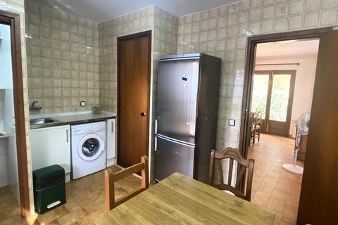 This cozy holiday home offers a comfortable stay with 4 bedrooms, including a master suite with a double bed and three rooms with two single beds each. The property also features 3 full bathrooms, one with a shower and two with bathtubs, plus an addi...