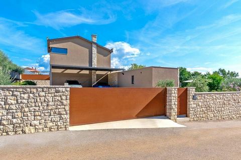 Designer house with swimming pool and wellness in Umag area! Total surface is 206 sq.m. Land plot is 1024 sq.m. The villa offers a luxurious living experience and was designed in accordance with professional standards, legal regulations, and spatial ...