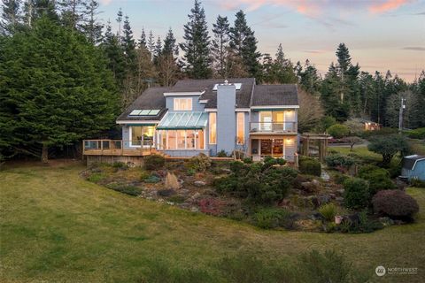 Breathtaking Waterfront Retreat w/ Spectacular Views! Experience the best of PNW living w/ this stunning waterfront home overlooking the Straits, Mt. Baker, and the majestic Cascade Range. Nestled on just under an acre, this serene sanctuary offers u...