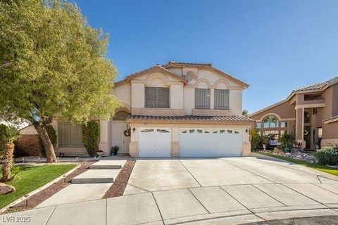 This beautiful two-story home features 5 bedrooms, 3 car garage, and a sparkling pool, all situated on a premium oversized cul-de-sac lot in the highly sought-after area of Henderson. Easy access to 215 freeway, close proximity to shopping, dining, a...