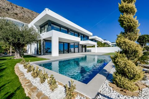 NEW BUILD LUXURY VILLA IN FINESTRAT WITH THE SEA VIEWS. NEW BUILD LUXURY VILLA IN FINESTRAT WITH THE SEA VIEWS New Build Luxury villa with the sea views in Sierra Cortina, Finestrat. Arriving at the Urbanisation there is a natural stone wall with a h...