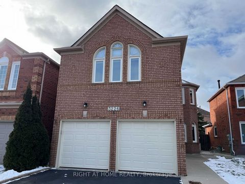 An enclosed front porch welcomes you to the new leaded glass double door entry and the foyer with it's crown moulding, chair rail, mirrored closet and a 2 piece powder room. The large living room with new windows and pretty half moon transoms above t...