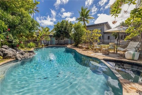 Offering the perfect blend of style and comfort, 120 Kuupua is a rare & private retreat in the heart of Kailua. This home seamlessly merges mid-century architectural charm w/ modern updates, wrapping around a backyard oasis. The soaring great room, b...