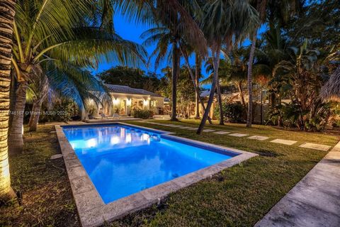 Nestled in Miami's upper east side neighborhood in the prestigious guard-gated community of Belle Meade, this waterfront gem boasts 62 feet of direct water frontage on a wide canal with no fixed bridges, offering effortless access to Biscayne Bay and...