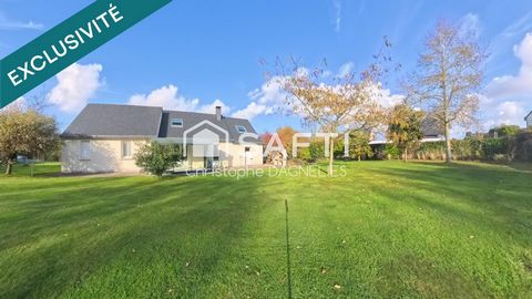 Maison familiale avec jardin paysager - 3 chambres, bureau, garage et véranda.