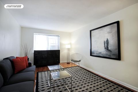 Welcome to Residence 2C at 102-25 67th Road. Home. It means everything. It means kicking off shoes, dropping keys into a bowl on the sideboard in the dining room, and having enough space in your well-appointed eat-in kitchen for you (and maybe a frie...