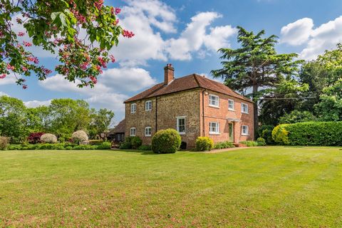 Home Farm is a Grade II listed farmhouse with an impressive, attached barn and equestrian facilities, set within grounds of approx. 4 acres. Located within the tightly held and vibrant village of East Clandon and less than 10 minutes from Guildford t...