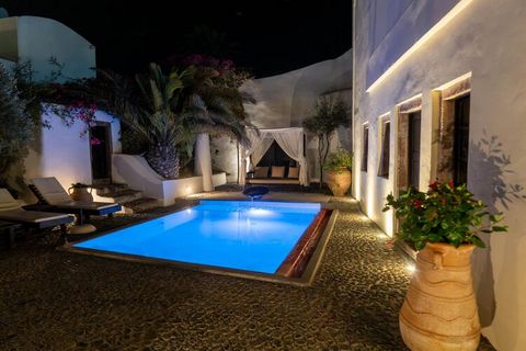 A unique villa just a stone's throw away from the cozy town of Megalochori, and yet surrounded by peace and space. When you open the impressive wooden front door, you step into a private courtyard with pool. The luxurious villa features a large loung...