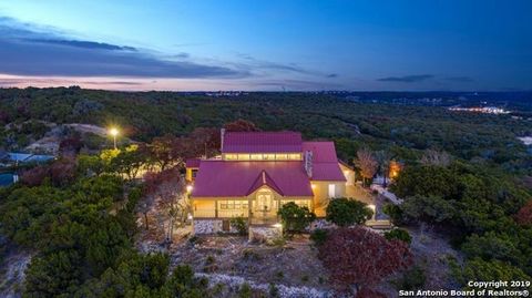 ABSOLUTELY BREATHTAKING VIEWS of Kerrville & the Hill Country await you. Private 6.43 acres. Great room offers incredible walls of windows, high coffered ceilings, gleaming hardwood floor, built-ins & native stone fireplace. Approximately 3,000 sq ft...