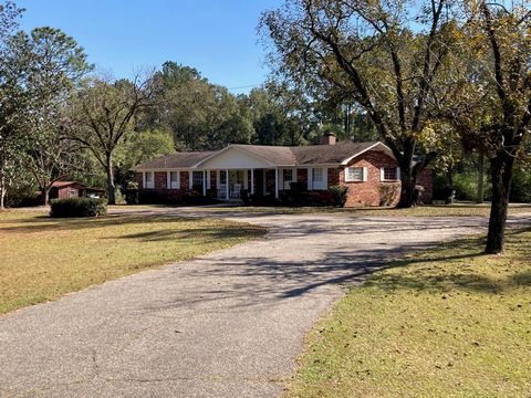 Welcome to your serene country retreat! This charming 3-bedroom, 2-bathroom all-brick ranch is nestled on over 3.5 acres of picturesque countryside within the city limits of Bonifay. Step inside to discover an inviting open-concept layout that seamle...