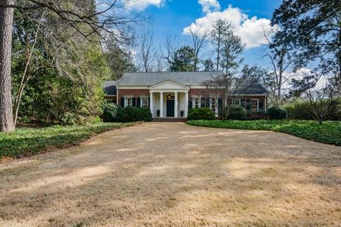 Timeless Buckhead construction, scarcely used by seller and primed for your personal taste. 9' ceilings, wide-plank pegged hardwood floors, and copious natural light give main an alluring elegance. Large foyer invites the eye forward into stately liv...