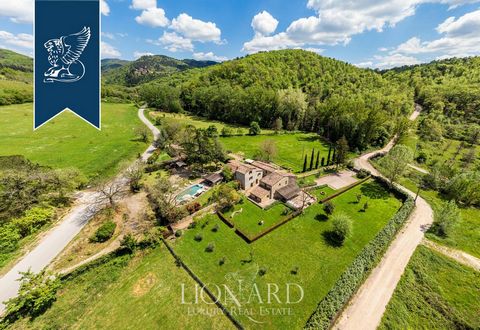 This fabulous luxury farmhouse with two pools for sale is surrounded by Tuscany's leafy countryside, its typical olive trees and fine vineyards. Its beauty can be admired from its beautiful private garden, which measures 2.45 ha and houses two w...