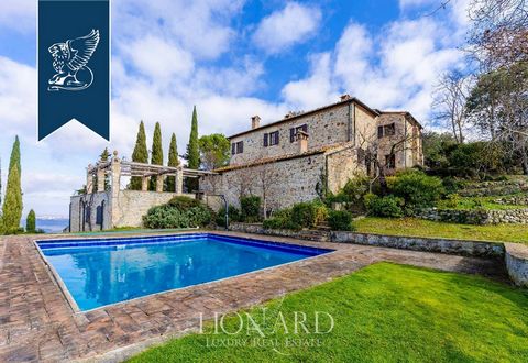 Nestled atop a hill in Colle Val d'Elsa, in the province of Siena, this 600-sqm luxury villa offers panoramic views of the valley below. Situated on 7 hectares of land featuring a private garden, an olive grove, and a vineyard, the property incl...