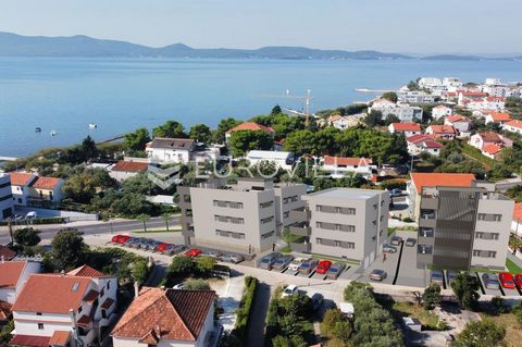 Zadar, Sukošan, two-room apartment in a building with a total of six apartments. Building C, apartment S4 consists of an entrance hall, two bedrooms, bathroom, guest toilet, open concept kitchen, dining room and living room, laundry room and balcony....