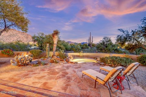 Welcome to a charming, modern Southwest single level turnkey home w/ no interior steps in the guard gated, highly desirable neighborhood of Desert Highlands. Golf & club membership is immediate in this award-winning community. This tastefully updated...