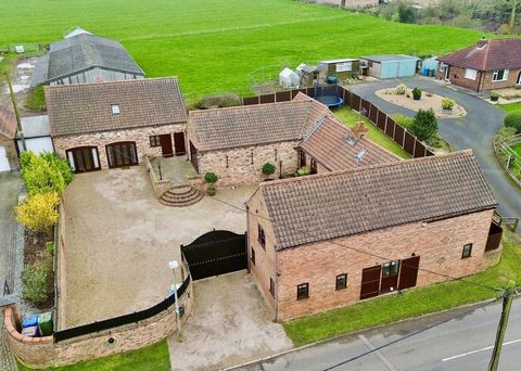 Millstone Barn is a converted barn offering much original character and charm as well as huge scope and potential for a range of different uses. The property currently splits into a well presented four-bedroom family home with the additions of offici...