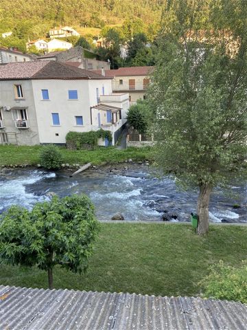 Summary Situated in the heart of the picturesque village of Axat in the Aude region in southern France, close to all amenities, this large11 room property, requiring some restoration, with a large balcony, offers panoramic views over the river Aude a...