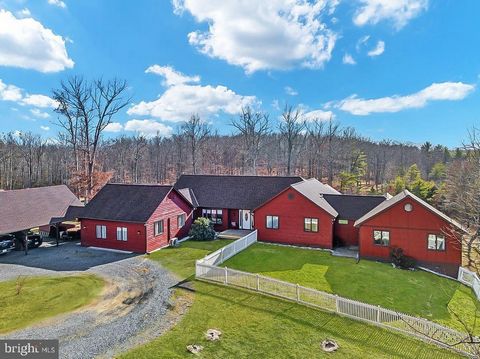 Please No Drive-Bys. Discover your ultimate secluded retreat nestled on 59.41 unrestricted acres of pristine Virginia countryside in Middletown, VA. Mountain views, in-ground pool, private acreage, one level living at its best! Over 3200 finished & u...