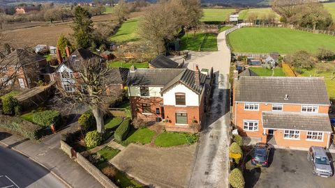 **NO CHAIN** Nestled within approximately 3.5 acres of picturesque grounds, Highfield House is a remarkable three-bedroom equestrian property boasting stables and a menage. Originally built in the 1930s, the home has been meticulously renovated by it...