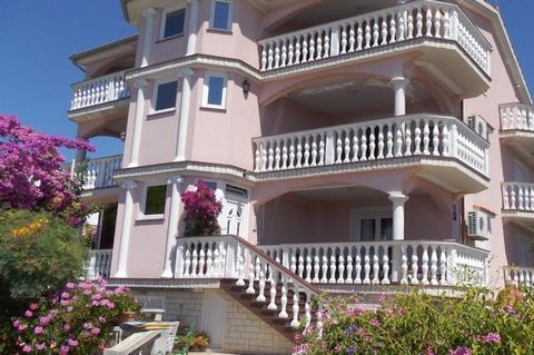 Apart-house on Vir island only 40 meters from the beach! Total area is 570 sq.m. Land plot is 1096 sq.m. Property was built in 2004 and renovated in 2022. The detached house consists of three floors where there are two residential units on each floor...