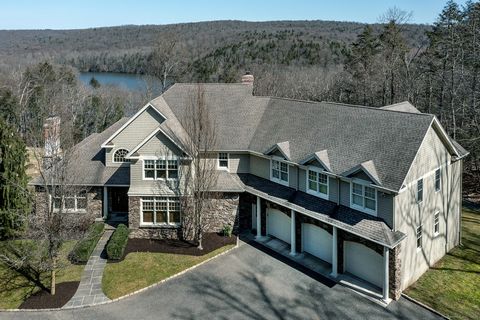 Set on 3.81 acres. on a private cul-de-sac, on scenic Lake Lillinonah, this custom waterfront home has it all! A dramatic 2 story entry w/circular stair, welcomes you to this impeccably maintained home with 10 ft main level ceilings, wide plank, hard...