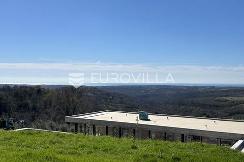 For sale is this beautiful building plot located in a quiet settlement in the town of Krasica on elevated ground, with an open view of the greenery and the sea, and only 5 minutes by car from Buje. It has an area of 1004 m2, is located next to a road...