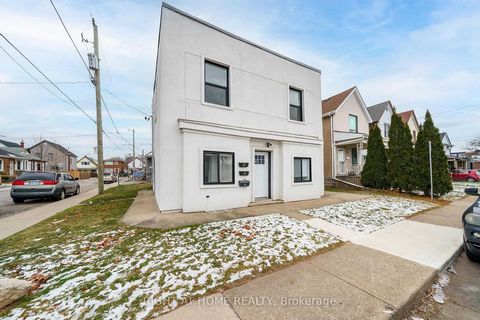 Welcome to 32 Britannia Avenue, a fully renovated (2021) triplex steps from trendy Ottawa Street in Hamilton. This income-generating property offers $4,775 in monthly rental income from three self-contained units: an upper 2-bedroom, 1-bathroom unit ...