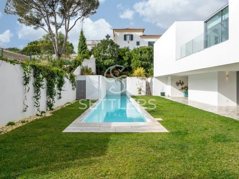 Detached 4-bedroom house with contemporary architecture, inspired by architect Aires Mateus, in a premium location in Estoril. Set on a plot of 1085 m² with a built area of 418 m², the property is distributed across 3 floors as follows: Ground floor:...