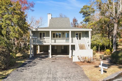 Welcome to Windsong Villas in the beautiful gated golf community of Brick Landing, where mainland living feels like a serene island escape! Located just minutes from the shores of Ocean Isle Beach, this inviting 3-bedroom, 2-bathroom home boasts main...