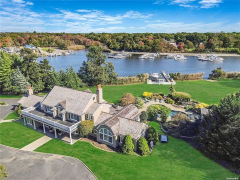 This Stunning Waterfront Estate Offers An Unparalleled Blend Of Luxury And Nature On Nearly 2 Acres Along Champlin Creek. The Home Features Charming Cedar Shake Roofing And A Grand Two-Story Entry. Inside, You'll Find Wide Plank Wood Floors And Custo...