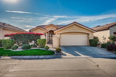 Experience breathtaking southern mountain and fairway views from this beautifully updated Canterbury model located on the 9th fairway at Heritage Palms C.C. This light-filled home offers open living/dining areas complete with cozy fireplace, 2 bedroo...