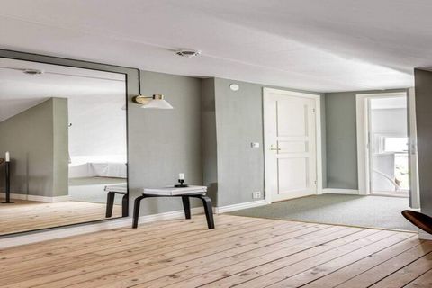 Nestled in a historic guest house dating back to 1924, this charming retreat in Båstad offers a tranquil escape just 500 meters from the sandy beach. Surrounded by lush gardens, the property features 40 individually furnished rooms spread across six ...