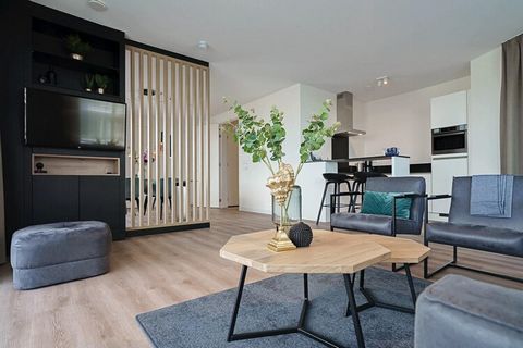 Dieses einladende Familienapartment im ersten Stock bietet die perfekte Mischung aus Komfort und Stil und ist so gestaltet, dass jeder Aufenthalt unvergesslich wird. Der offene Wohnbereich verfügt über eine gemütliche Sitzecke, einen Esstisch für Fam...