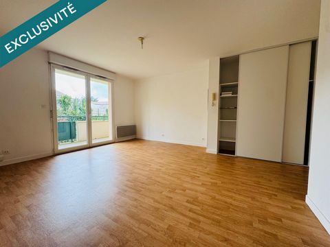 T2 avec balcon, cave et place de stationnement