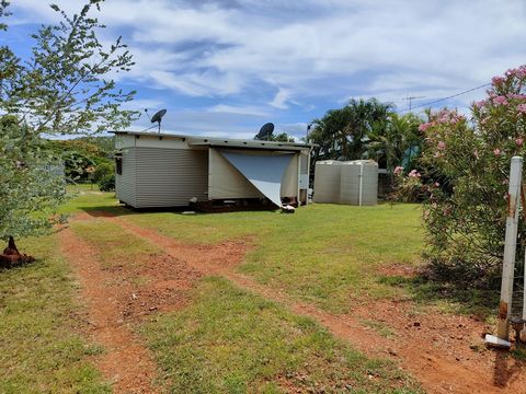 What is there not to love about this property. A fully fenced 1012m2 gently sloping block with a neat little 8x4m cottage. One bedroom, bathroom / laundry combined, kitchen (no stove) living space and two decks. One at the front to enjoy the view of ...