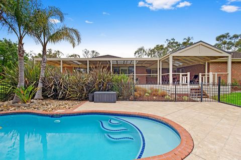 Offers Closing Monday 13th May 6:30pm. Delivering a lifestyle-lover’s oasis on 2.5 acres (approx) with a resort-inspired allure, this sprawling entertainer will spoil every member of the family with its choice of living areas, work-from-home convenie...