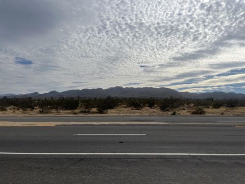 315 Acres of Raw Land ready to showcase a new project. Zoned JT/RL/5- residential... Opportunities are endless. Located across the street from Joshua Tree RV and Campground.
