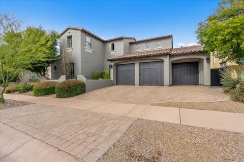 Welcome Home! High-end Finishes and Luxury Features throughout this incredible Home situated on a corner lot in the highly desirable DC Ranch Desert Haciendas Gated Community. Featuring 5 Bedrooms, a huge Downstairs Office, Workout Room (that has a c...